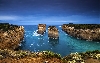 The Great Ocean Road is lined with spectacularly carved ocean cliffs