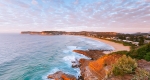 Dip your feet in the water at Avoca Beach