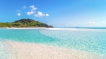 Put your feet in the soft white sand of Whitehaven Beach