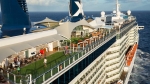 Get fresh air on the lawn at the top level of the ship